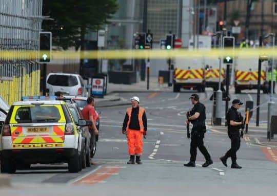 Emergency teams at the scene of the Manchester attack