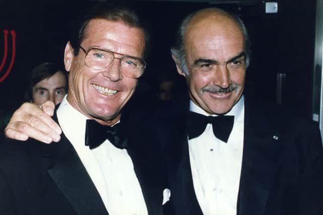 Roger Moore, left, with friend and fellow Bond Sean Connery. Picture: Contributed