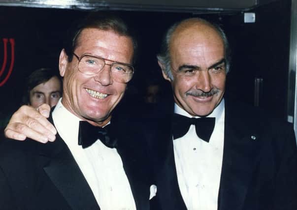 Roger Moore, left, with friend and fellow Bond Sean Connery. Picture: Contributed