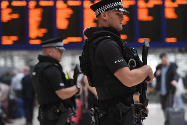 Armed police at Glasgow Central Station.