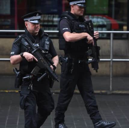 Armed police at Glasgow Central Station..