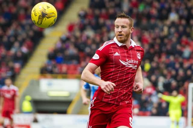 Adam Rooney is anxious Aberdeen don't end the season with a 'treble' of second places. Picture: Sammy Turner/SNS