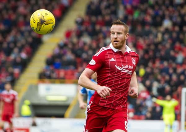 Adam Rooney is anxious Aberdeen don't end the season with a 'treble' of second places. Picture:  Sammy Turner/SNS