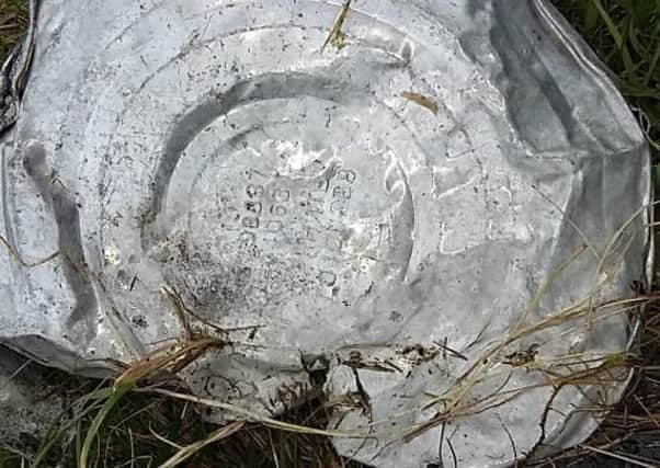 A tin can from a Soviet klondyker found during clean-up of Scottish beach. Picture: Scottish Wildlife Trust