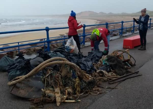 Environmentalists from Dutch group By the Ocean We Unite display marine litter collected during a beach-clean in Fraserburgh with local scouts and campaigners from Surfers against Sewage.

 Picture: Nanne van Hoytema