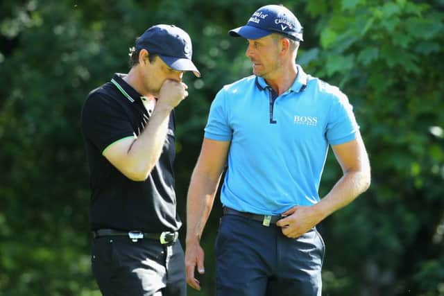 Henrik Stenson, right, chats to Scots actor Dougray Scott during the BMW PGA Championship Pro-Am at Wentworth. Picture: Warren Little/Getty Images