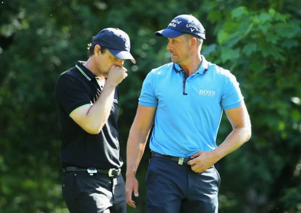 Henrik Stenson, right, chats to Scots actor Dougray Scott during the BMW PGA Championship Pro-Am at Wentworth. Picture: Warren Little/Getty Images