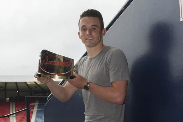 Hibernian's John McGinn with the Ladbrokes Championship Player of the Season award. Picture: Craig Foy/SNS