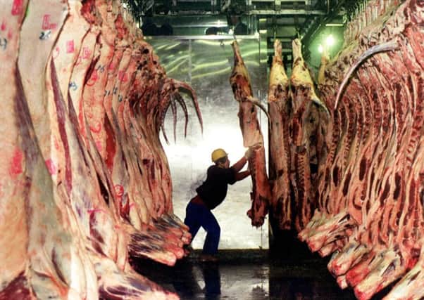Dawn Meats and Dunbia are combining their operations in the UK. Picture: Ahn Young-joon/AP