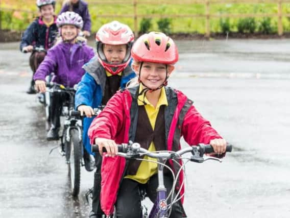 Cycling to school is is on the increase but fewer pupils are walking. Picture: Ian Georgeson