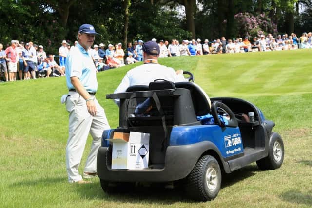 Ernie Els talks to rules official Simon Higginbottom on the 14th hole. Picture: Getty Images