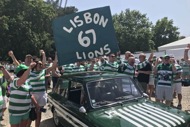 Celtic fans with a 1967 Hillman Imp, which was driven from Glasgow to Lisbon.