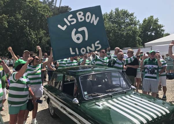 Celtic fans with a 1967 Hillman Imp, which was driven from Glasgow to Lisbon.
