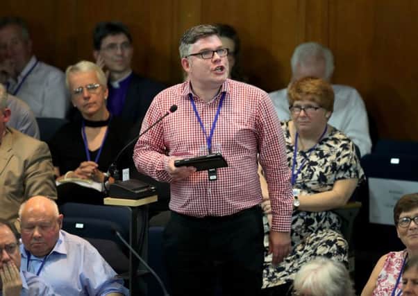 Gay minister Rev Scott Rennie speaks during the General Assembly of the Church of Scotland yesterday.