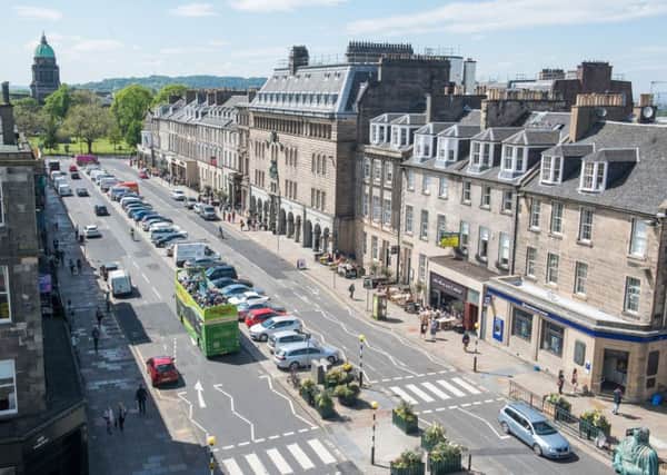 Essential Edinburgh manages Â£1million a year from city centre businesses, which helps keep the Improvement District area clean and generates more shoppers with services and events. Picture: Ian Georgeson.
