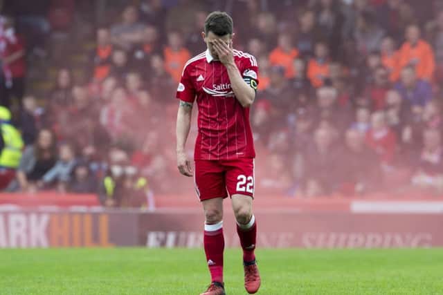 09/04/17 LADBROKES PREMIERSHIP ABERDEEN v RANGERS (0-3) PITTODRIE - ABERDEEN Dejection for Aberdeen's Ryan Jack after conceding