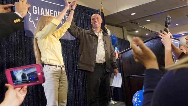 Republican Greg Gianforte scelebrates with supporters after being declared the winner at a election night party for Montana's special House election. Picture: Janie Osborne/Getty Images