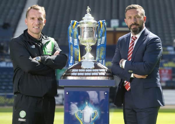 Celtic manager Brendan Rodgers, left, believes his Aberdeen counterpart Derek McInnes would be the 'perfect fit' for the Sunderland job. Picture: Craig Foy/SNS