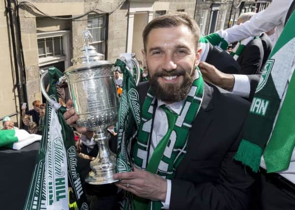 Although he wasn't picked for last season's Scottish Cup final, Kevin Thomson enjoyed the victory parade the next day.

Picture: Alan Rennie