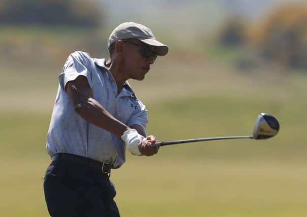 Former US president Barack Obama plays a round of golf at the Old Course in St Andrews. Picture: Andrew Milligan/PA