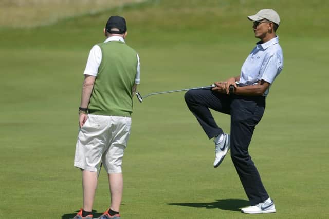 Barack Obama enjoyed himself at St Andrews. Pic: SWNS