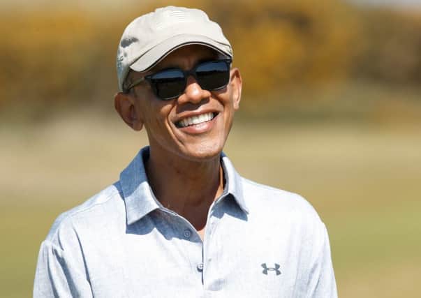 Obama at the Old Course in 
St Andrews on Friday, before 
he headed to Edinburgh to deliver his speech. Picture: Robert Perry/Getty