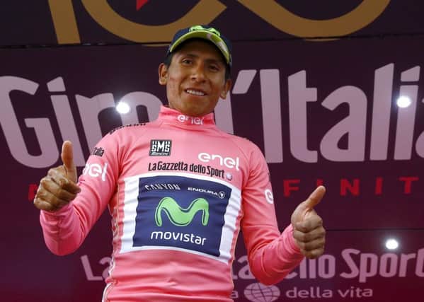 Colombian cyclist Nairo Quintana celebrates his overall leader pink jersey after the 20th stage of 100th Giro d'Italia. Picture: Getty Images