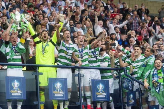 Scott Brown lifts the William Hill Scottish Cup as his side seal the treble. Pic: SNS/Craig Foy