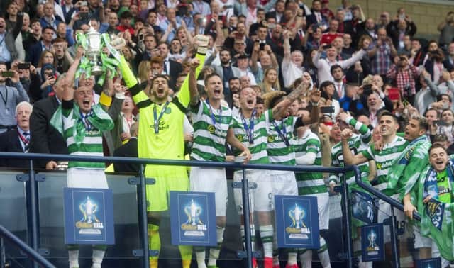 Scott Brown lifts the William Hill Scottish Cup as his side seal the treble. Pic: SNS/Craig Foy