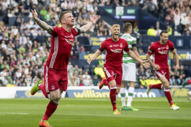 Jonny Hayes celebrates his opener. Pic: SNS/Bill Murray