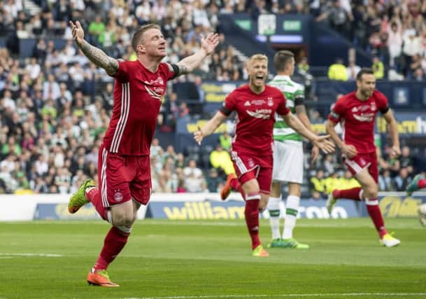 Jonny Hayes celebrates his opener. Pic: SNS/Bill Murray