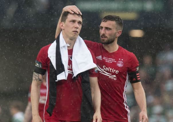 Dejected Aberdeen pair Ryan Jack and Graeme Shinnie at full time. Pic: SNS/Craig Foy