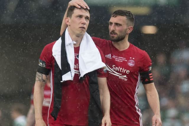 Dejected Aberdeen pair Ryan Jack and Graeme Shinnie at full time. Pic: SNS/Craig Foy