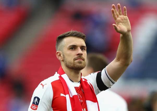 Match winner Aaron Ramsey hails the fans. Picture: Ian Walton/Getty Images