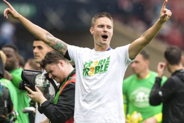 Celtic's Mikael Lustig celebrates at full time. Picture: Craig Williamson/SNS