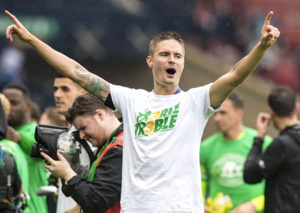 Celtic's Mikael Lustig celebrates at full time. Picture: Craig Williamson/SNS