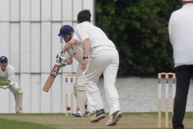 Watsonians Andrew Chalmers is bowled by Gordon Goudie. Picture: Toby Williams