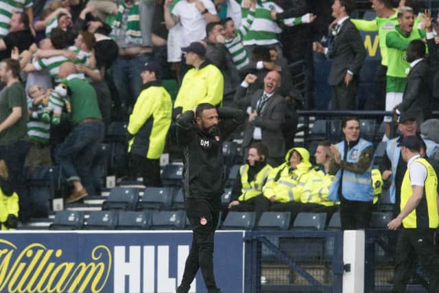 Aberdeen manager Derek McInnes looks downcast after his side's late Scottish Cup final defeat by Celtic. Picture: SNS