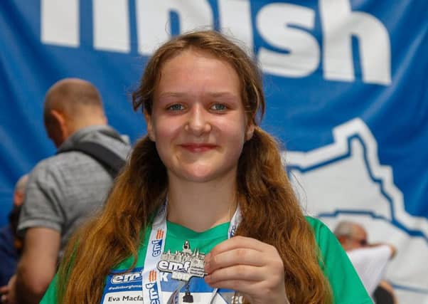 Eva MacFarlane (13) after completing the 5k at The Edinburgh Marathon Festival. Picture:TSPL