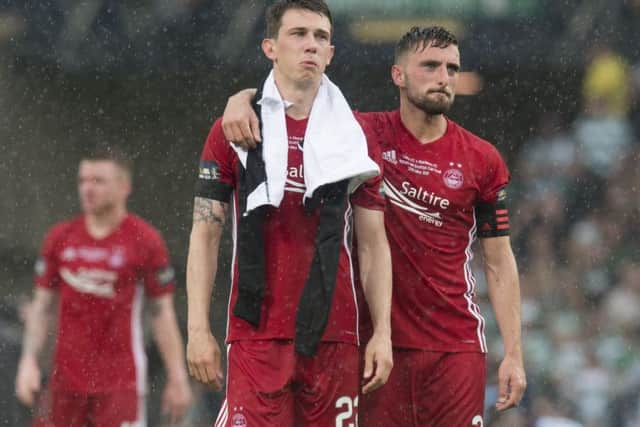 Aberdeen captain Graeme Shinnie consoles Ryan Jack at full-time. Picture: SNS