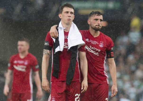 Aberdeen captain Graeme Shinnie consoles Ryan Jack at full-time. Picture: SNS