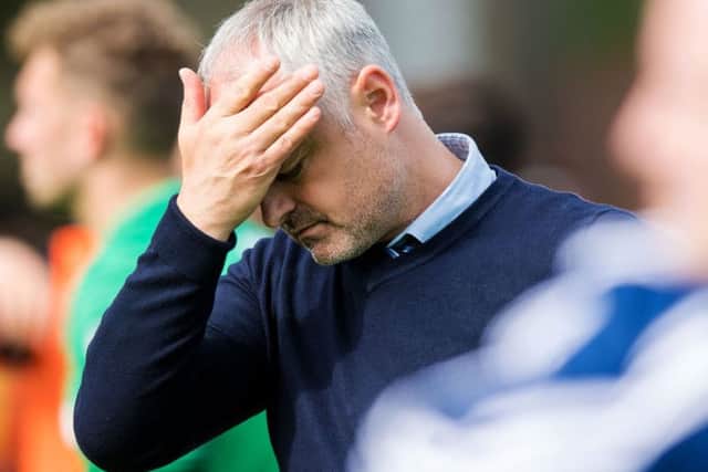 Dundee United manager Ray McKinnon in despair after his side's defeat by Hamilton Accies. Picture: SNS