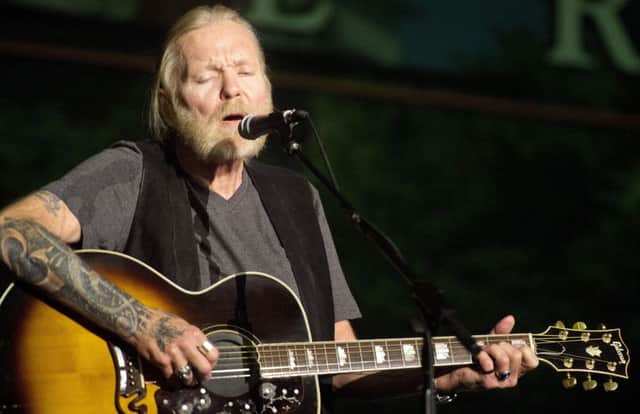 In this May 16, 2016 photo, Rock and Roll Hall of Famer Gregg Allman performs during Mercer University's Commencement Saturday at Hawkins Arena in Macon, Ga. Allman received an honorary Doctor of Humanities degree. On Saturday, May 27, 2017, his manager said the musician has died. He was 69. (Jason Vorhees/The Macon Telegraph via AP)