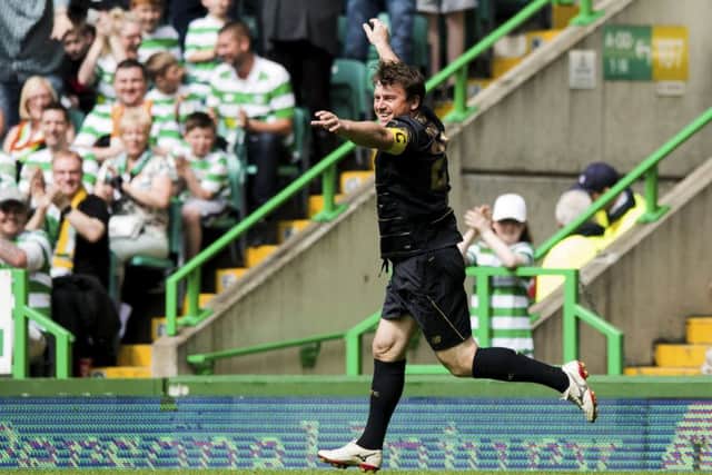 Lubo Moravcik celebrates after scoring his side's second goal. Picture: SNS