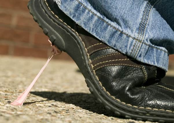 Sticky problem: Chewing gum is the most common item littering Scotland's streets - each piece costs councils 50 times more to remove from a pavement than its puchase price.