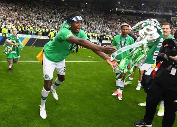 Dedryck Boyata in the party mood after the Scottish Cup final victory over Aberdeen on Saturday. Picture: SNS