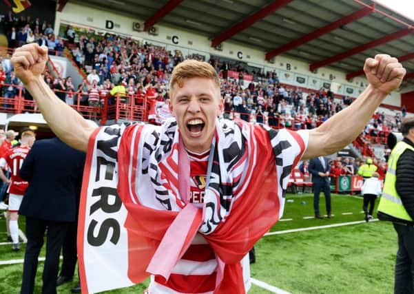 Greg Docherty screams in delight after helping Hamilton retain their Premiership status.