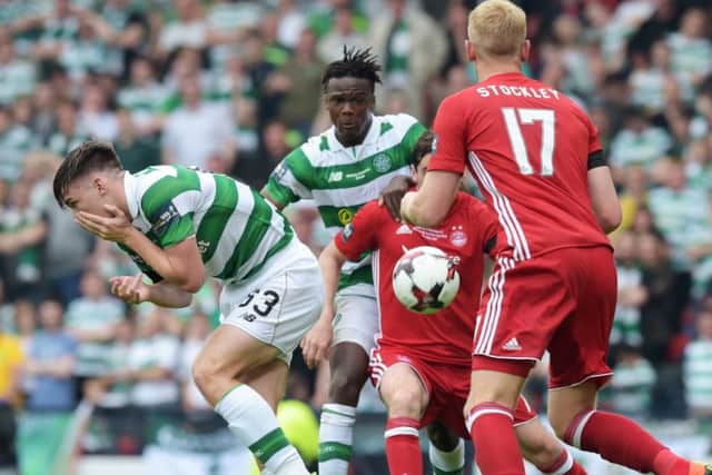 Kieran Tierney, left, reacts after being struck in the face during the Scottish Cup final. Picture: SNS
