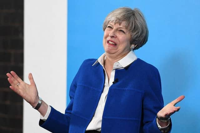 Theresa May could be on course to lose the General Election and the UK faces a hung parliament, according to a seat projection poll.  (Photo by Leon Neal/Getty Images)