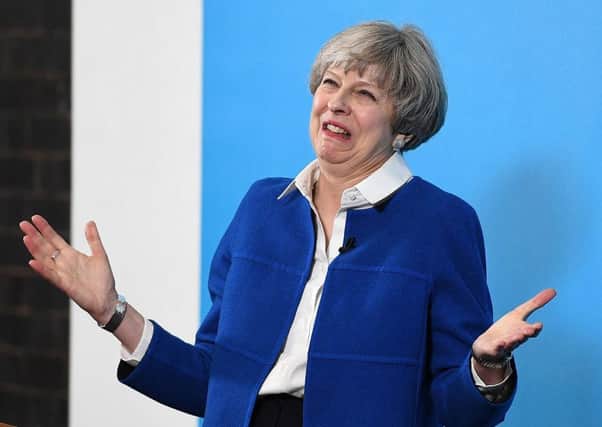 Theresa May could be on course to lose the General Election and the UK faces a hung parliament, according to a seat projection poll.  (Photo by Leon Neal/Getty Images)